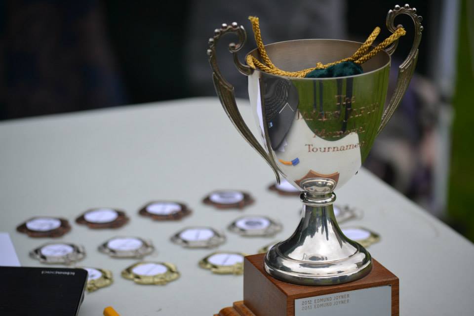Small trophy and medals on a table